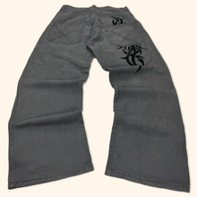 Load image into Gallery viewer, Energie 2000s Embroidered Tribal Baggy Jeans (L)
