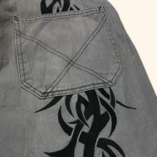 Load image into Gallery viewer, Energie 2000s Embroidered Tribal Baggy Jeans (L)